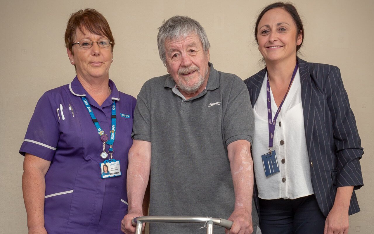 Carers with patient at hospital